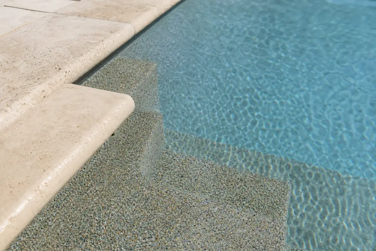 New pebble plaster pool surface